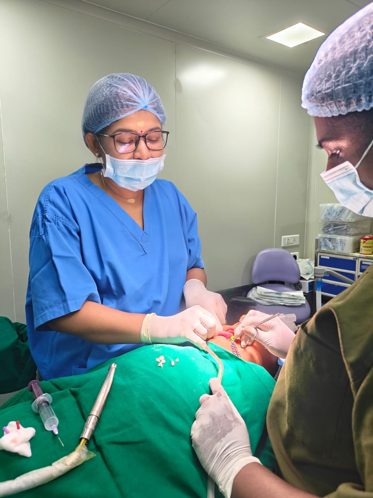 Chairside procedure — Dr. Bhuvaneswari at work